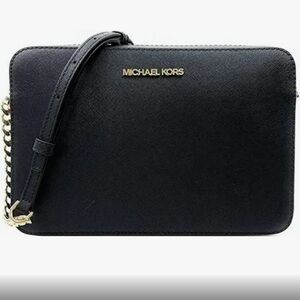 Micheal Kors Purse
Black and gold